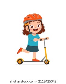 cute little girl riding scooter and wear helmet