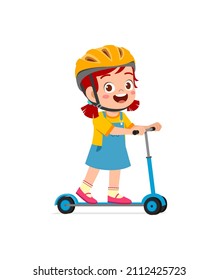 cute little girl riding scooter and wear helmet