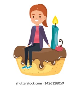 cute little girl seated in cake with candle