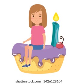cute little girl seated in cake with candle