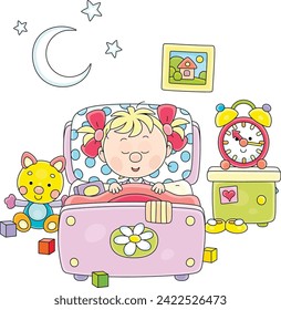 Cute little girl sleeping in her pretty small bed among funny toys in a nursery room on a moonlit night, vector cartoon illustration isolated on a white background