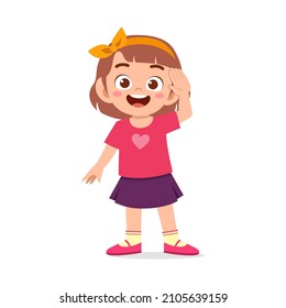 cute little girl stand and give salute pose