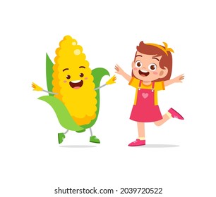 Cute Little Girl Stands With Corn Character