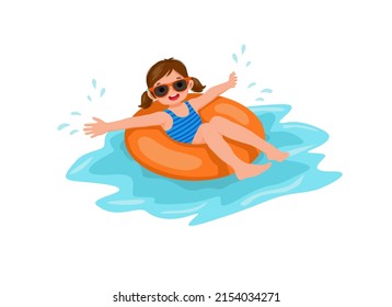 cute little girl with swimsuit and sun glasses lying on inflatable rubber ring having fun floating in swimming pool on summer time