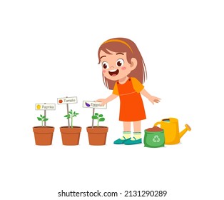 cute little girl take care of vegetable plant