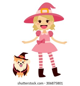 Cute little girl wearing pink witch Halloween costume and mascot dog with witch hat and cape