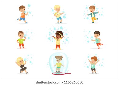 Cute little girls and boys blowing and playing soap bubbles