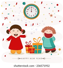 Cute little girls pointing to the clock and showing time for Happy New Year party celebration with gifts on stylish background.