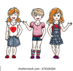 Cute little girls standing in stylish casual clothes. Vector set of beautiful kids illustrations.