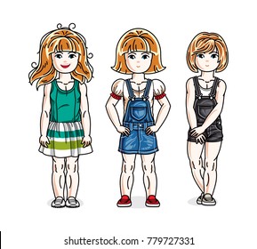Cute little girls standing in stylish casual clothes. Vector kids illustrations set. Childhood and family lifestyle cartoons.