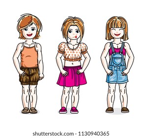 Cute little girls standing wearing fashionable casual clothes. Vector kids illustrations set. Childhood and family lifestyle cartoons.