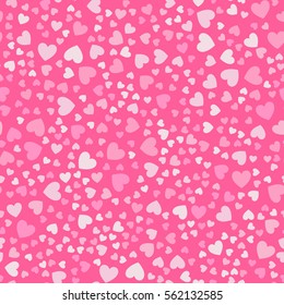 Cute little hearts in seamless pattern. Small heart shapes in different sizes and colors for Valentines Day background. Vector illustration.