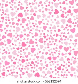 Cute little hearts in seamless pattern. Small heart shapes in different sizes and colors for Valentines Day background. Vector illustration.