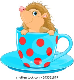 Cute little Hedgehog sits in the tea cup