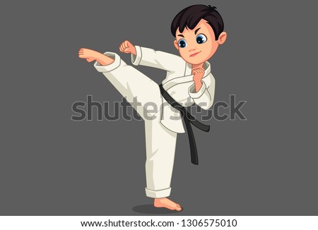 Cute little karate boy in karate pose 1