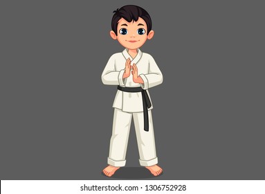 Cute little karate boy in standing pose