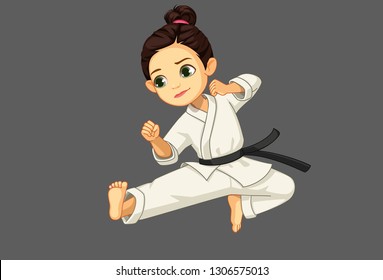 Cute little karate girl in karate pose 1