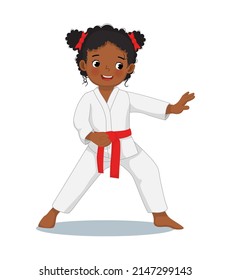 cute little karate kid African girl with black belt showing hand defense techniques poses in martial art training practice