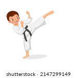 cute little karate kid boy with black belt showing kicking attack techniques poses in martial art training practice