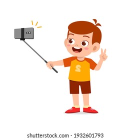 cute little kid boy pose and selfie in front of camera