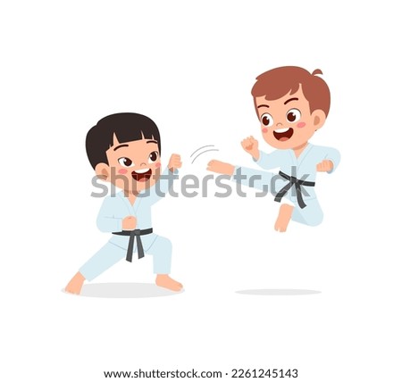 cute little kid training karate with friend together