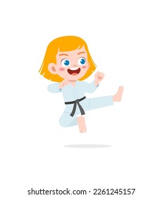 cute little kid training and showing karate pose