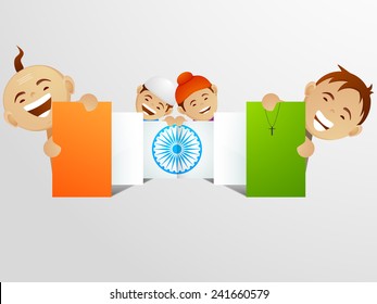 Cute little kids belongs from various religions of India enjoying and holding national tricolor boards with Ashoka Wheel for Indian Republic Day celebrations. 