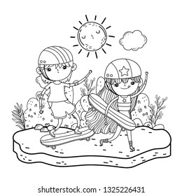 cute little kids mounted in skateboard in the landscape