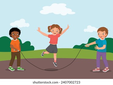 Cute little kids playing jumping rope at the park