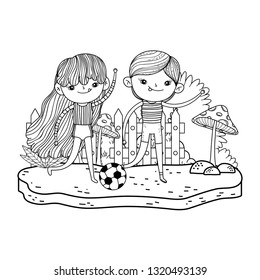 cute little kids playing soccer in the landscape