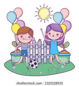 cute little kids playing soccer in the landscape