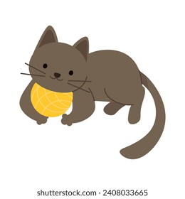 Cute little kitten lies next to a yellow ball of yarn