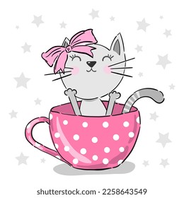 Cute little kitty girl with pink bow inside the cup