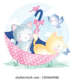 Cute little kitty sitting inside the umbrella