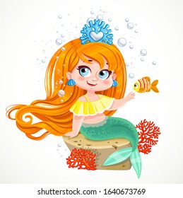 Cute little mermaid girl in coral tiara sit on a small stone with red coral among air bubbles isolated on white background