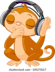 Cute little Monkey listening music with headphones