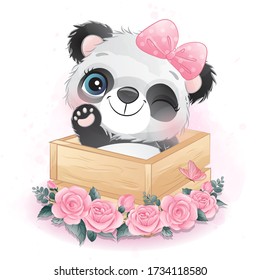 Cute little panda sitting inside a box