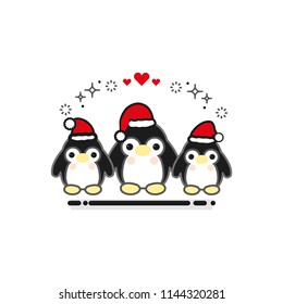 Cute little penguin wearing Santa's hat for Christmas.