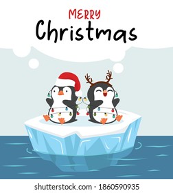 Cute little penguins wishing a Merry Christmas on ice floe