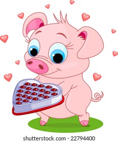 Cute little piglet holding a heart shape valentine box of chocolates