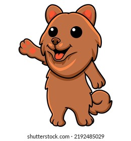 Cute little pomeranian dog cartoon waving hand