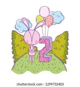 cute little rabbit with balloons helium in the landscape