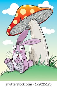 Cute little rabbit sitting underneath mushroom