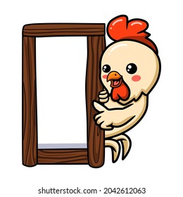 Cute little rooster cartoon with wooden board