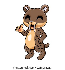 Cute little smilodon cartoon giving thumbs up