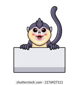 Cute little snub nosed monkey cartoon holding blank sign