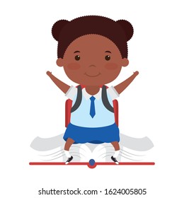 cute little student afro girl seated in book character vector illustration design