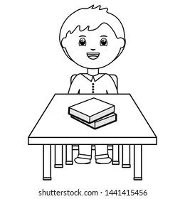 cute little student boy with books in schooldesk