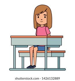 cute little student girl in school desk