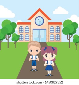 cute little students front of school building